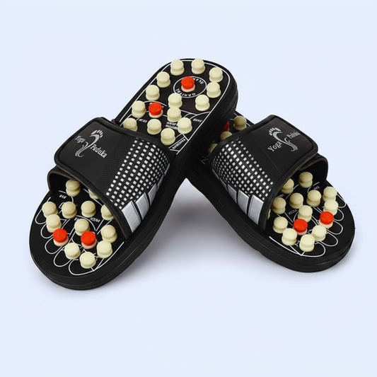 Pair of black yoga paduka slippers with acupressure nodes