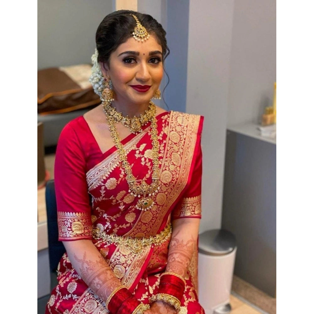Woman in a red and gold traditional outfit 