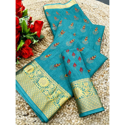 Turquoise saree with gold and red patterns
