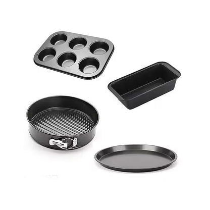 Set of black baking pans including a muffin tray, loaf pan, round perforated pan, and round flat pan.