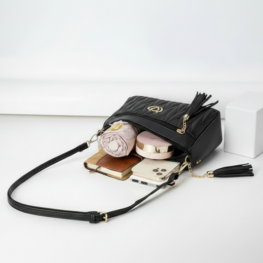 Black handbag with tassels