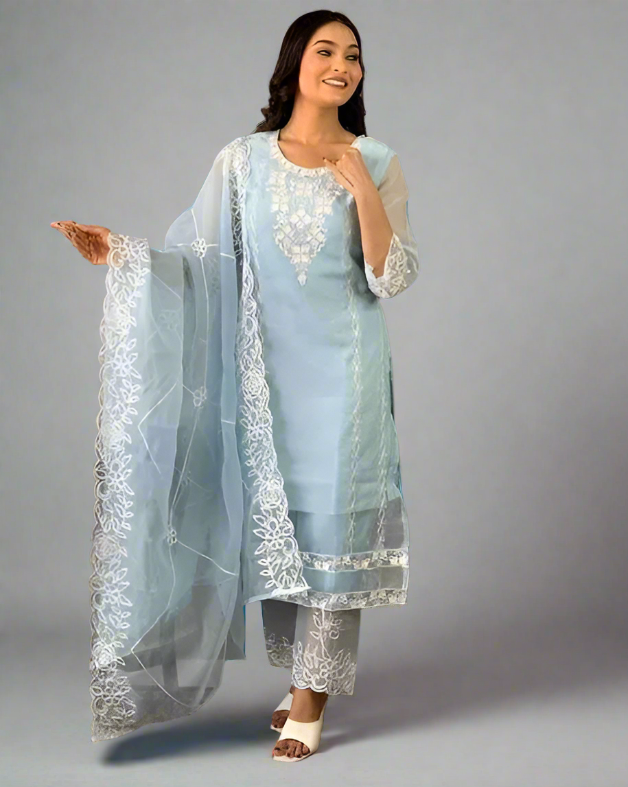 Woman wearing a light blue traditional outfit