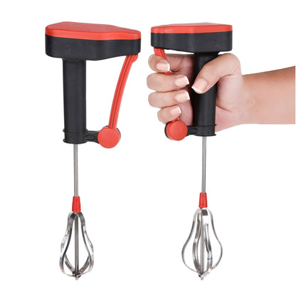 Handheld egg beater